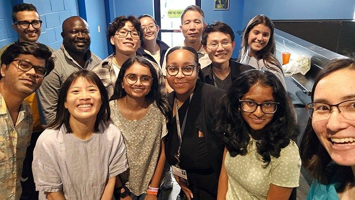 Photo of Pan Lab members bidding farewell to Aishani Gargapati as she leaves for medical school and welcoming Elise and Shreya as our newest undergraduate volunteers.