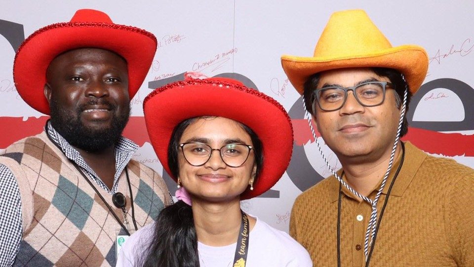 Photo of Pan Lab members Benjamin Aghoghovwia, Aishani Gargapati, and Anand Singh at the 2025 Pain Research Consortium symposium at UT MD Anderson