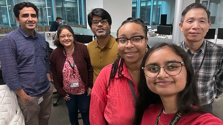 Photo of Pan Lab members sporting red garb for Valentine's Day