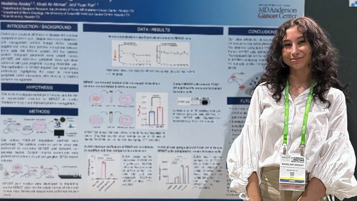 Photo of Pan Lab member Madeline Ansley presenting a poster at the 2025 AACR Annual Meeting in Chicago