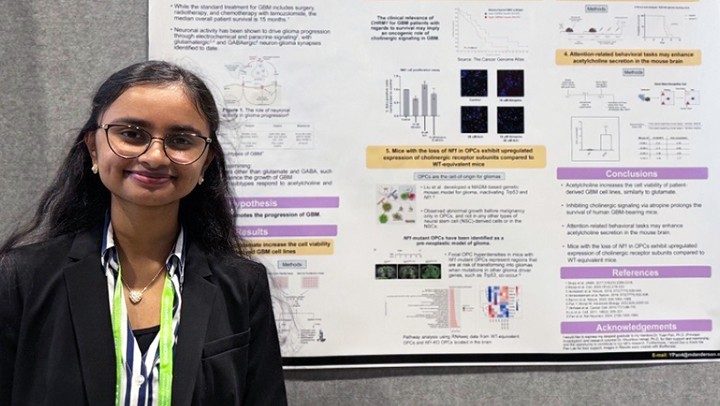 Photo of Pan Lab member Aishani Gargapati presenting a poster at the 2025 AACR Annual Meeting in Chicago
