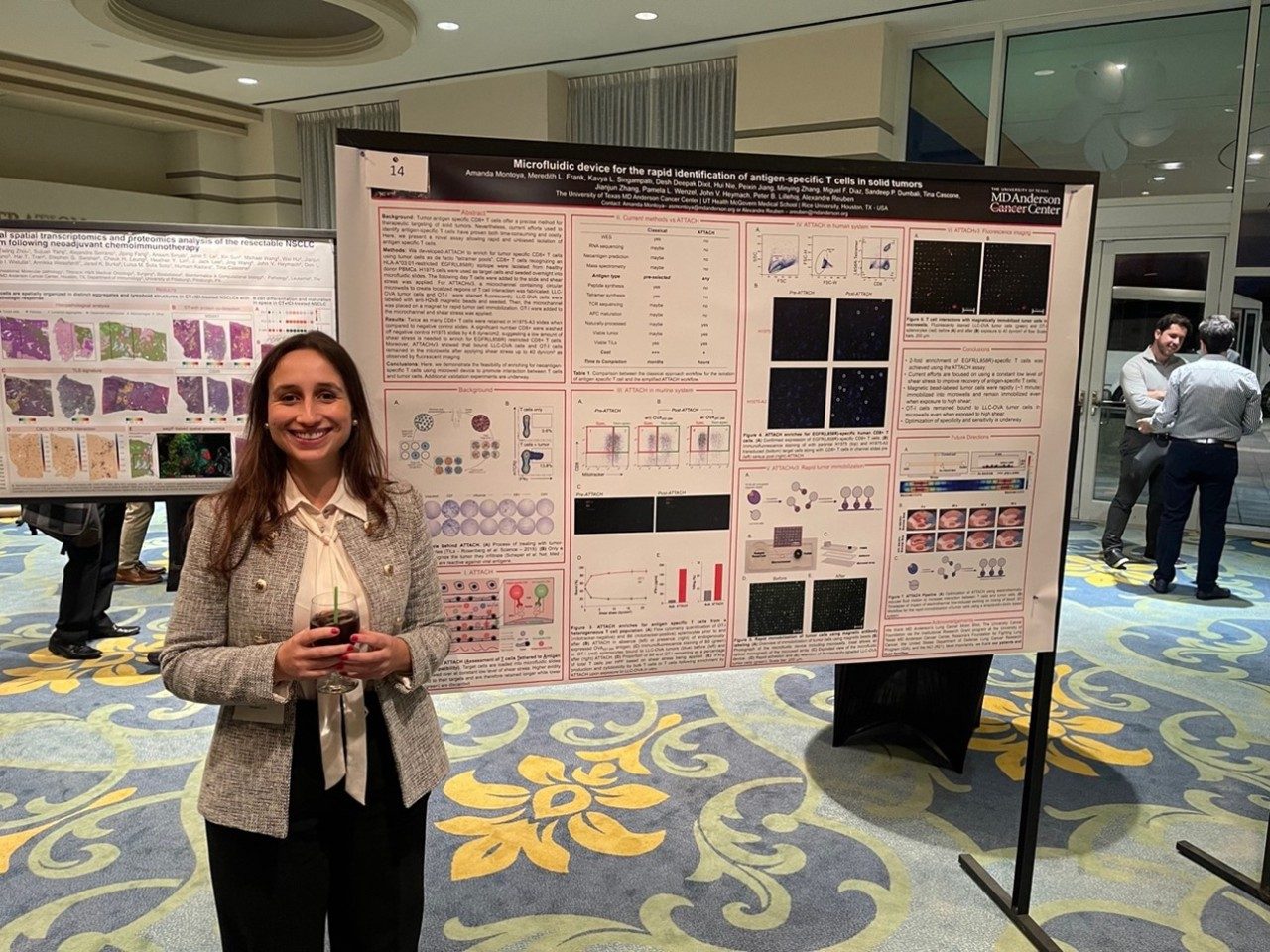 Amanda posing next to her poster