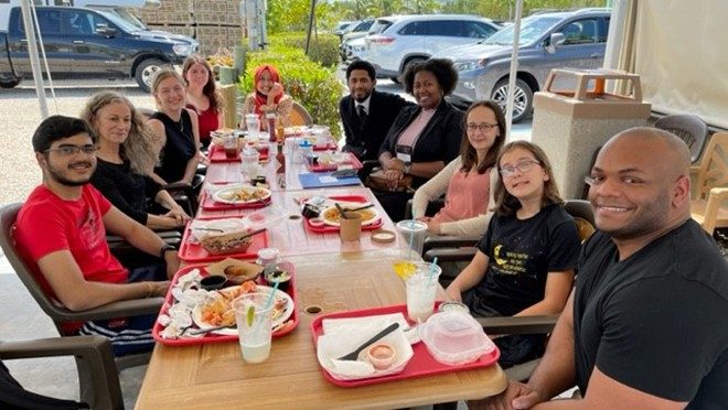 Large group around a table