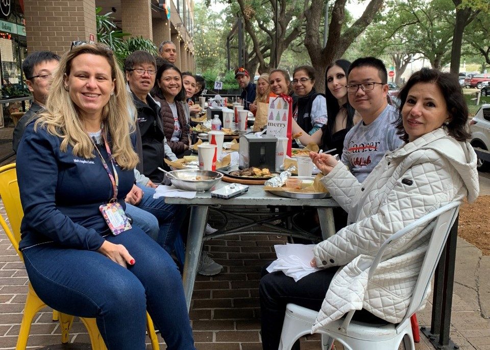 Members of the Welsh Laboratory enjoy a meal outside