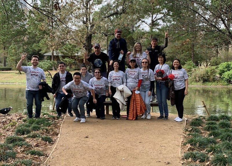 Welsh Laboratory group photo in front of a pond