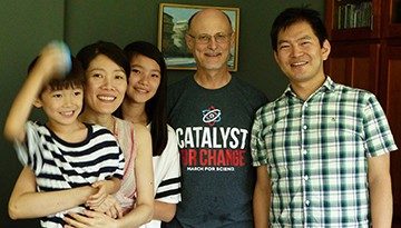 Photo of Dr. Wood with former Wood lab member Kei-Ichi Takata and his family.