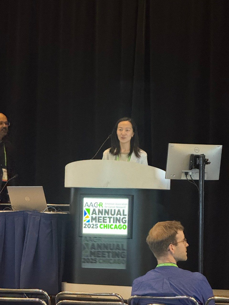 Woman standing at podium