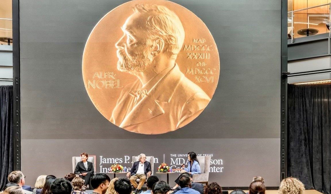 Two Nobel prize winners and the moderator of the chat