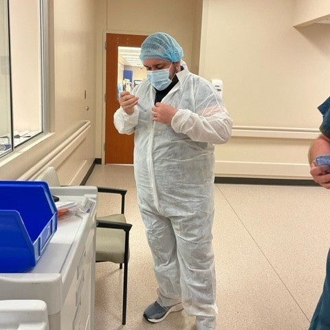 Someone wearing full protective gear