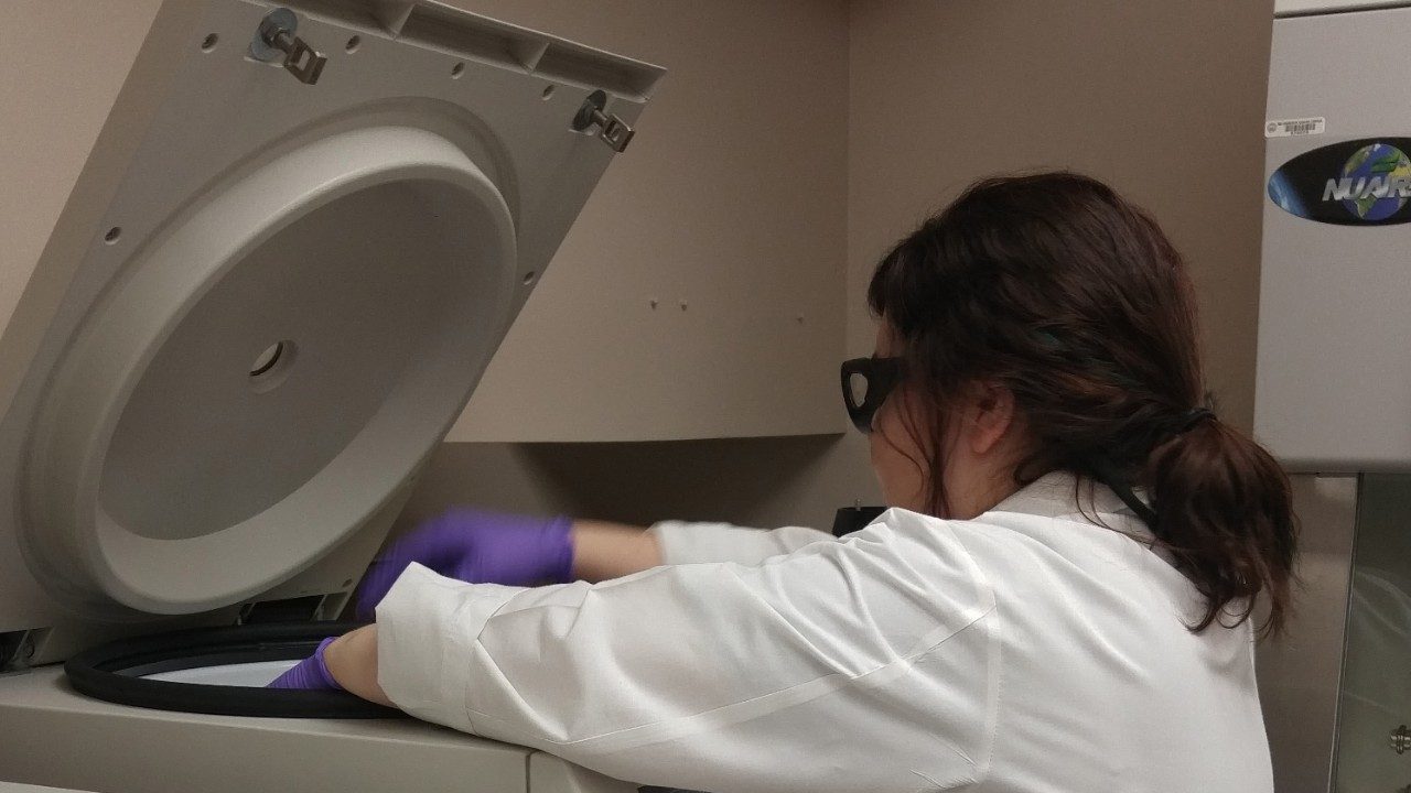 ITB lab member works at equipment