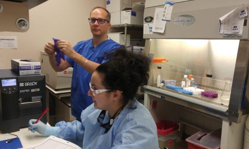 Two ITB members in the lab